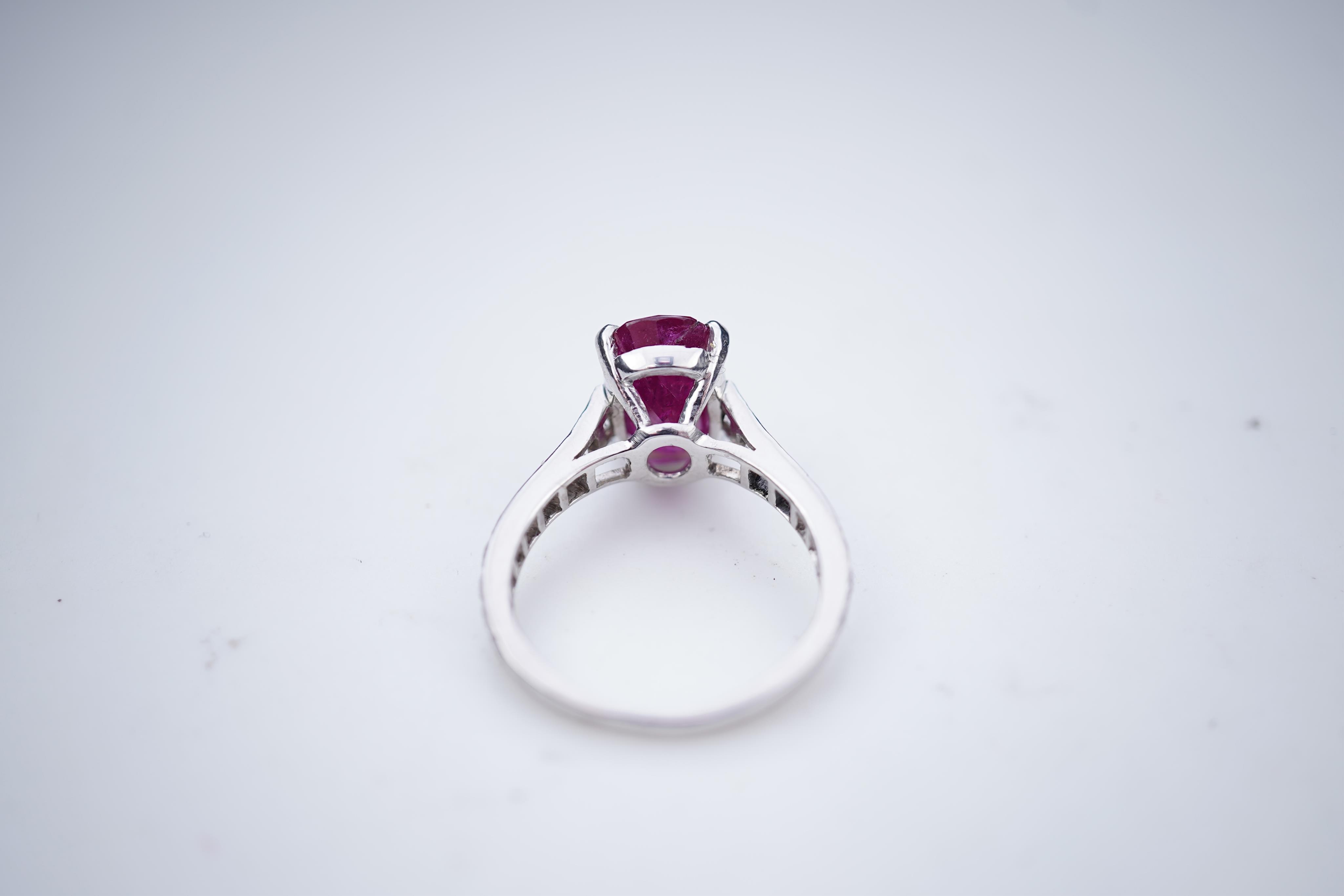 An attractive unheated ruby and diamond ring